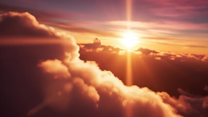 A magnificent sunset casts warm light over soft, fluffy clouds, creating an enchanting sky. The clouds glow with vibrant colors, emphasizing the beauty of the tranquil sunset.