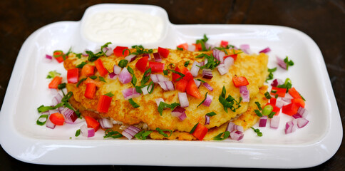 Breakfast. Omelette with tomatoes, avocado, blue cheese and green peas on white plate. Frittata...