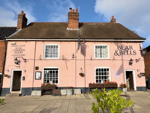 The Bear & Bells traditional English pub, painted pink, in the East Anglian town of Beccles, Suffolk.