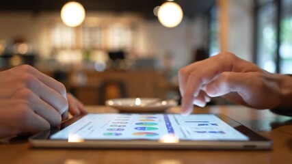 Hands using digital tablet with data display for business analytics and productivity - Powered by Adobe