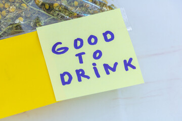 Good to drink handwritten message on sticky note about chamomile tea