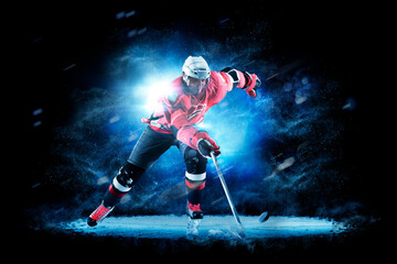 Hockey. Hockey players on a beautiful black background with a flash of light behind them. Isolated...