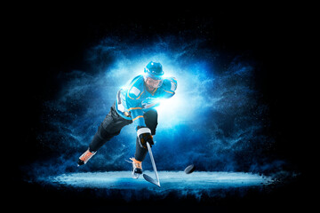 Fototapeta premium Hockey. Hockey players on a beautiful black background with a flash of light behind them. Isolated on a black background. Sports