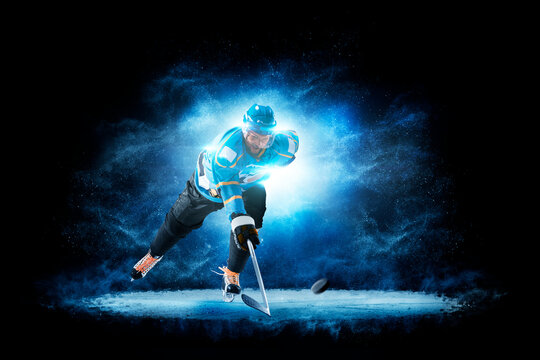 Hockey. Hockey players on a beautiful black background with a flash of light behind them. Isolated on a black background. Sports - Powered by Adobe