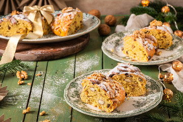 Portuguese Bolo Rainha, a festive dessert served during Christmas, New Year, and Epiphany, topped with almonds and walnuts, styled on a rustic table.
