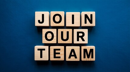 Wooden blocks spelling out join our team on a blue background, inviting collaboration and teamwork in a business or organization, fostering a sense of unity and purpose