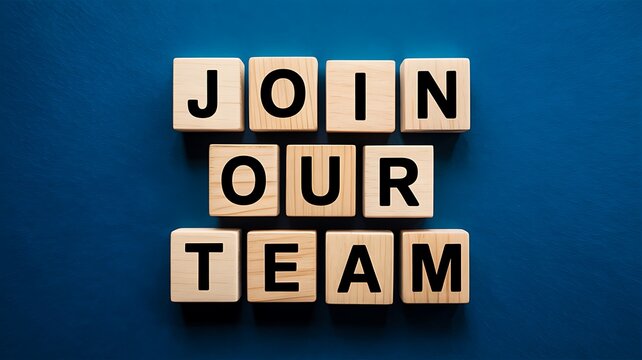 Wooden blocks spelling out join our team on a blue background, inviting collaboration and teamwork in a business or organization, fostering a sense of unity and purpose