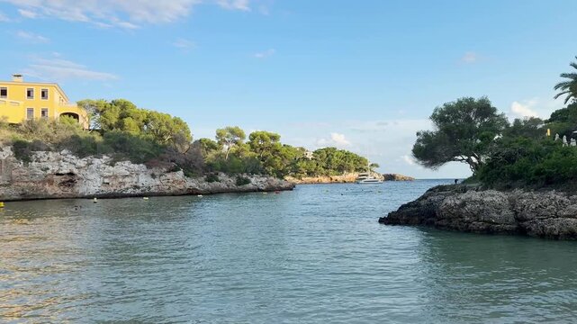 Cala Ferrera beach in the evening panoramic view. Cala D'or resort on Mallorca in Spain.