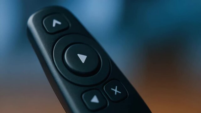 Mechanical remote control device with hand pressing button for electronic technology interaction and easy operation using directional buttons design