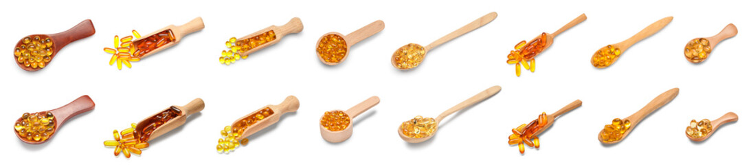 Set of scoops and spoons with vitamin E capsules on white background