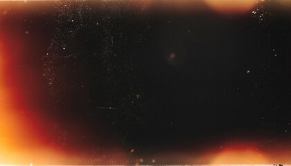 Chemical film decay creates mesmerizing crystalline grain patterns with warm orange light leaks on dramatic black backdrop