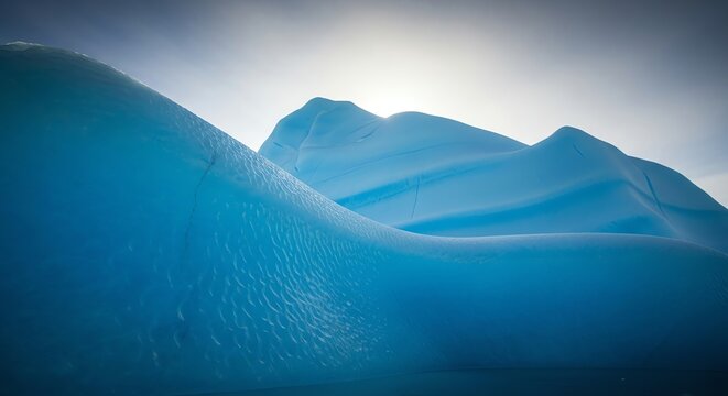 Blue iceberg formation in arctic waters - Powered by Adobe