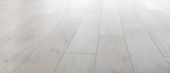 View of clean laminate floor in empty room
