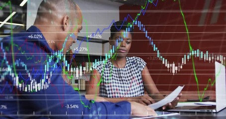 Man pointing file woman scanning, sharing docs while market graphs overlaying, analyzing data - Powered by Adobe