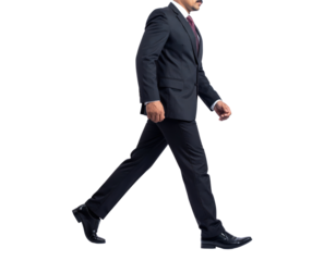 Confident businessman in a dark suit walking with purpose 1.