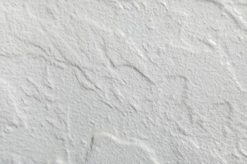 White concrete wall as background, closeup