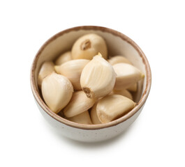 Bowl with fresh garlic cloves on white background