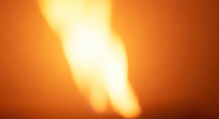 Abstract Blurry Orange and Yellow Flame Effect Background.