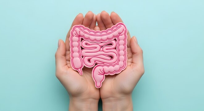 World Digestive Health Day Hands cradling a pink, stylized human large intestine illustration against a teal background, symbolizing gut health and digestive wellness