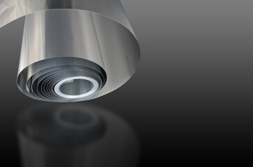 a silver aluminum roll glowing with a soft shadow effect on a dark background. twisted thin metal
