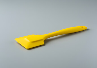 Bright yellow silicone spatula