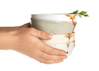 Female hands with dirty dishes isolated on white background