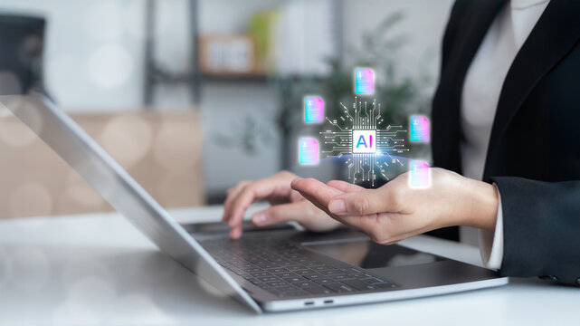 Businesswoman using a laptop with a virtual AI processor chip, managing digital document icons. Concept of artificial intelligence for data analysis, automated file management,