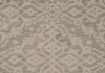 Detailed pattern of ornate design in neutral colors.
