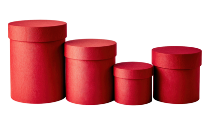 Four red cylindrical gift boxes of varied heights in a row