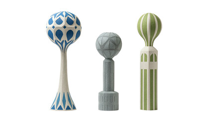 Three stylized, patterned decorative obelisk-like objects