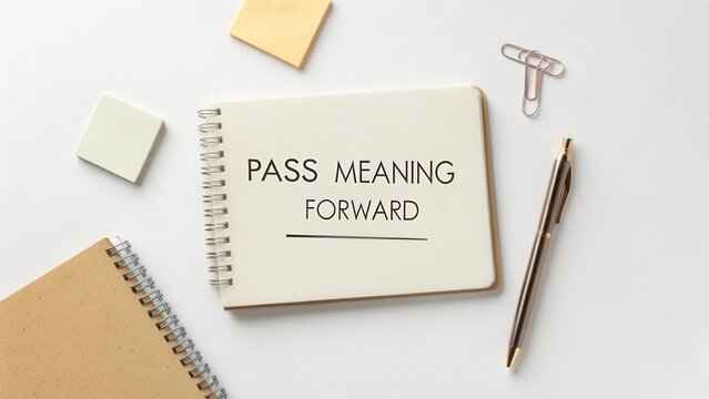 Inspirational stationery scene features notebook with empowering message, pen, paper clips, and sticky notes on clean workspace