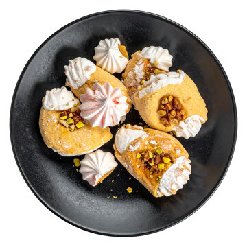 Traditional holodets meat jelly on a dark plate, isolated on white background a classic eastern european jellied broth with pieces of pork and herbs
