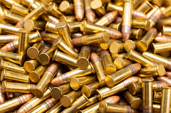 Marco of .22 ammunition bullets , Can be used as a background , Pile of .22 LR bullets