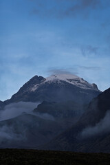 Nevado del Tolima at sunset from the mountains and hills of the p&aacute;ramo. Beautiful view of Los Nevados National Park in the mountains of Colombia.