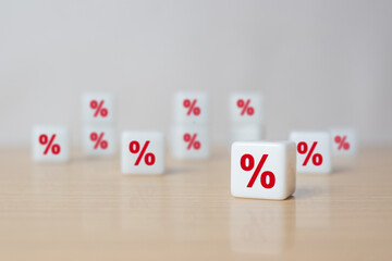 Interest rate financial and mortgage rates concept. Dice with icon percentage symbol