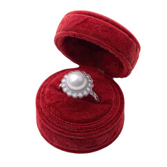 Pearl ring in a red velvet box, lid open