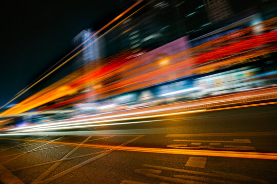 traffic with blur light through city at night
