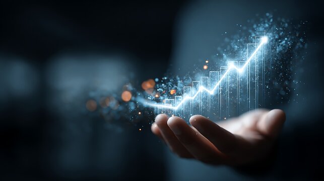 double exposure hand holding rising graph symbol overlay with hologram particles and financial data, digital economy growth