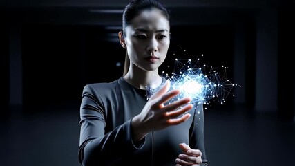 Particles of a futuristic technology network held by an East Asian businesswoman, a glowing data hologram representing science and innovation. - Powered by Adobe