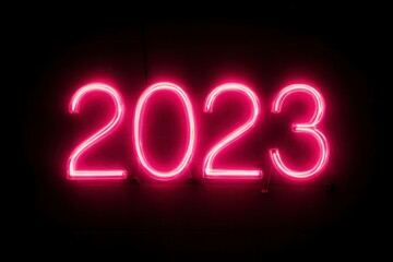 Bright Neon Sign Displaying Year 2023 in Vibrant Pink Color Glow