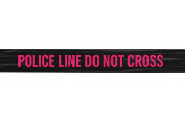 Police line do not cross warning tape acting as a barrier for security and investigation purposes, creating a restricted area
