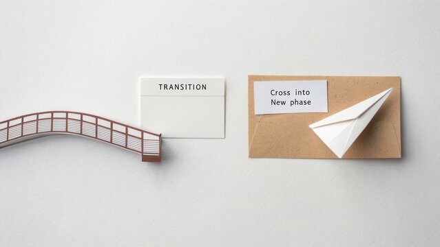 Conceptual metaphor for change and progress showcasing a bridge, paper plane, and signage illustrating transition and new beginnings