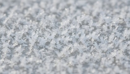 Macro close-up of fresh snow crystals showing intricate winter texture, clean and crisp details ideal for seasonal backgrounds, graphic design and high-resolution stock imagery.