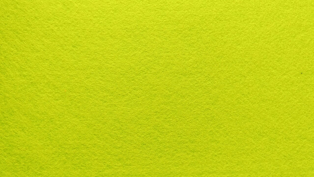 Bright Lime Green Felt Fabric Material Texture Background Displaying Rough Surface and Full Frame Copy Space