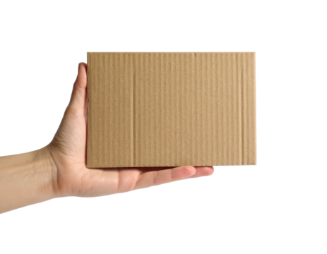 Stock photo of hand holding small cardboard box for shipping on transparent background