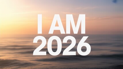 Text i am 2026 over a blurry ocean background at sunset or sunrise time
