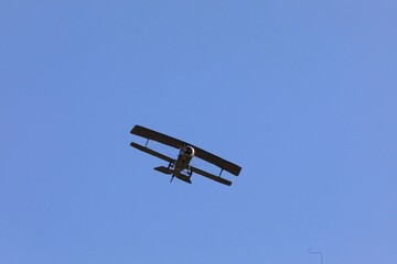 biplane in the air above