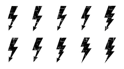 A collection of black grunge lightning bolt icons with a textured effect for design