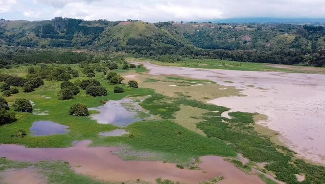Aerial Landscape of Wetlands and Vegetation in a Rural Valley