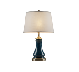 A chic dark blue ceramic table lamp with polished brass base and a glowing white fabric shade, offering warm ambient light for modern interiors, isolated on a clean transparent background